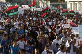 Protesters take part in a march in Benghazi city