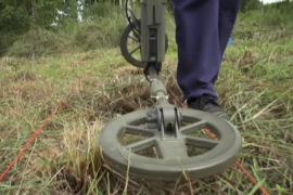 Women join in Laos demining