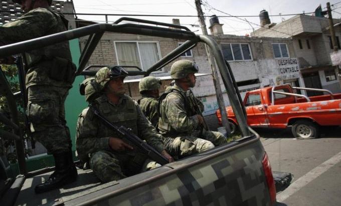 Soldiers patrol the streets in neighbourhood of Nezahualcoyotl in Mexico City