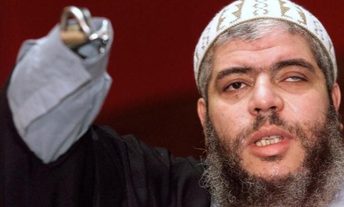 File photograph of Muslim cleric Abu Hamza al-Mazri addressing journalists at a news conference in London