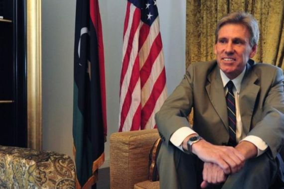 Christopher Stevens, the U.S. ambassador to Libya, smiles at his home in Tripoli