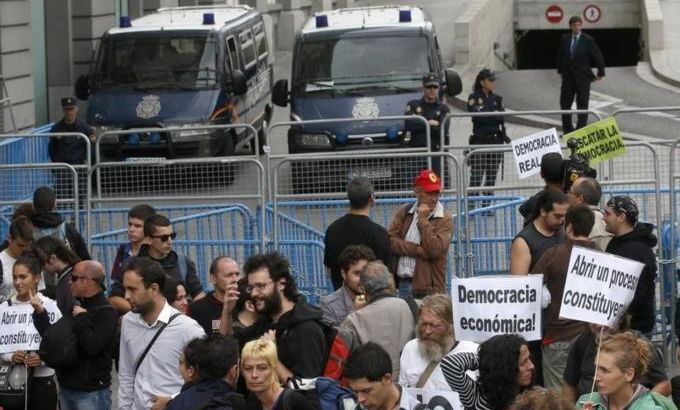 Protestors gather close to Spain''s Parliament ahead of a demonstration in Madrid