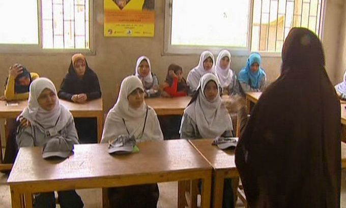 Schoolgirls in classroom in Egypt - still from Rawya Rageh package on UNESCO report
