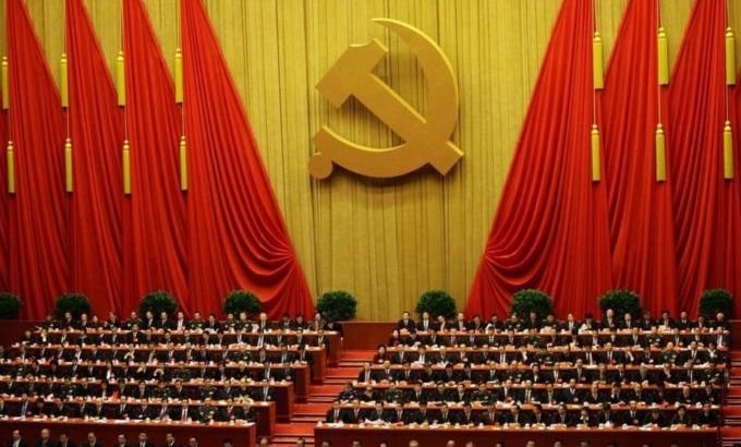 Delegates attend the closing session of 18th National Congress of the Communist Party of China at the Great Hall of the People in Beijing