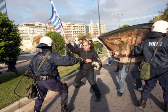 Greek protesters storm Greece-German meeting