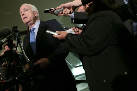 John McCain speaks to reporters