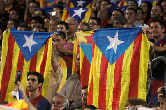 Spectators hold up Catalan pro-independence