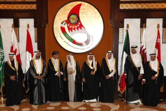 Dignitaries pose for a group photo prior to the start of the GCC Summit at Sakhir Palace in Sakhir south of Manama