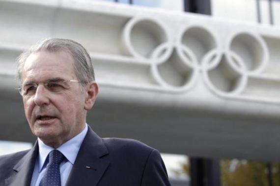 IOC President Rogge stands in front of IOC headquarters for an interview with Reuters in Lausanne