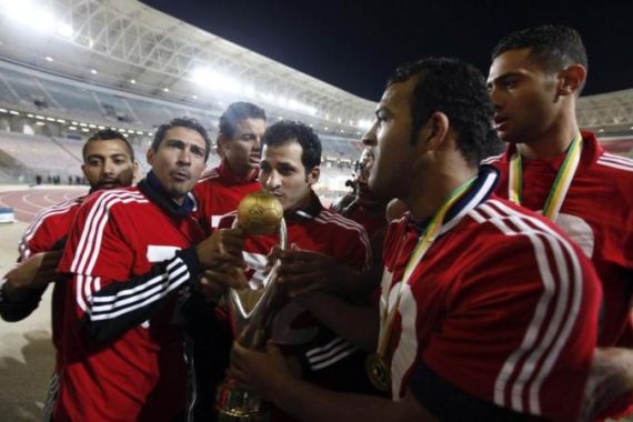 Egyptian Al-Ahly team celebrates after winning against Esperance de Tunis in their African Champions League final soccer match in Rades Stadium in Tunis