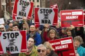 Many Americans support new gun restrictions, but will Obama get tough on the NRA? [AFP]