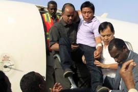 Injured Chinese worker Shou Sheng Tau arrives at Khartoum Airport after being released in western Darfur region