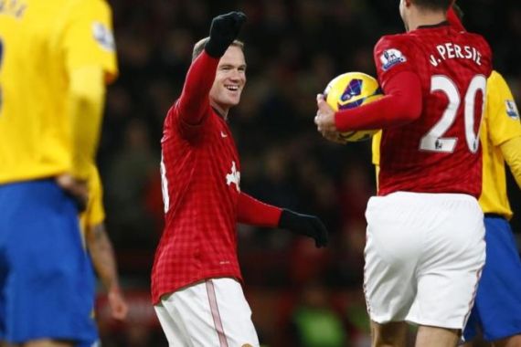 Manchester United''s Rooney celebrates scoring against Southampton during their English Premier League soccer match at Old Trafford in Manchester