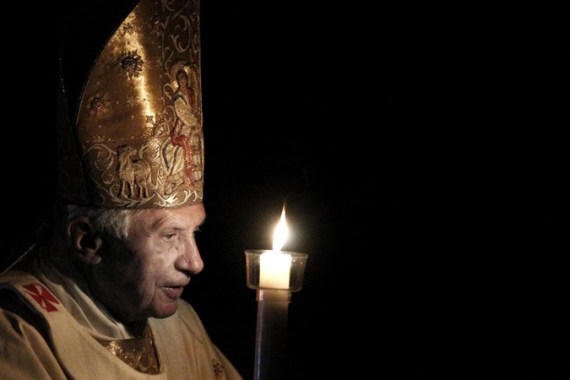 A file photo dated 07 April 2012 shows Pope Benedict XVI holding a candl