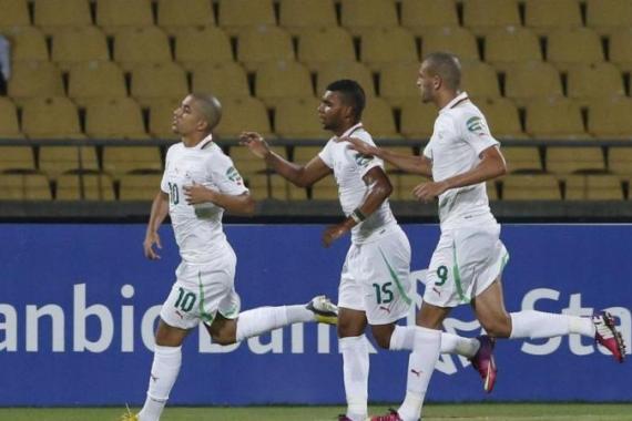 Algeria''s Feghouli, Soudani and Slimani celebrate a goal during their African Nations Cup (AFCON 2013) Group D soccer match against Ivory Coast in Rustenburg