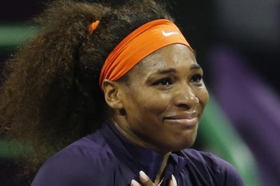Serena Williams of the U.S. reacts after defeating Petra Kvitova of Czech Republic during their women''s quarter-final match at the Qatar Open tennis tournament in Doha