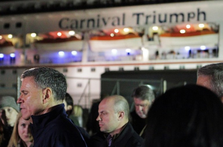 Carnival cruise ship passengers disembark