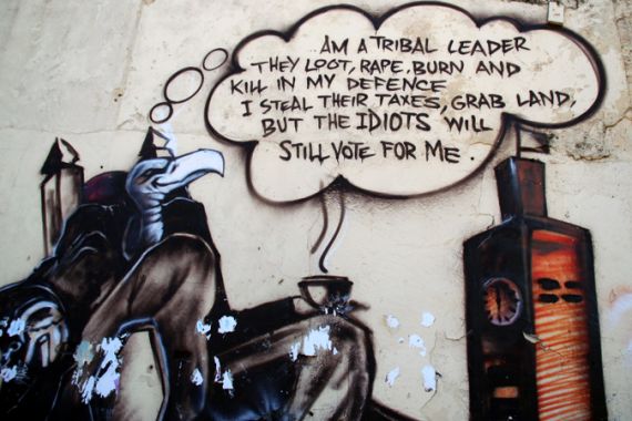 Image of vulture/politician graffiti in Nairobi''s business district