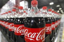 File photo of bottles of Coca-Cola are seen in a warehouse at the Swire Coca-Cola facility in Draper