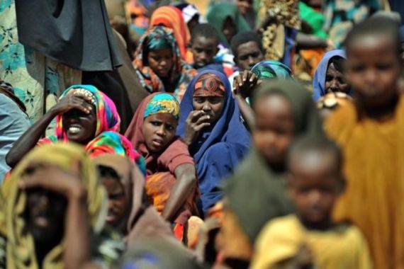 Newly arrived Somali refugees wait outsi