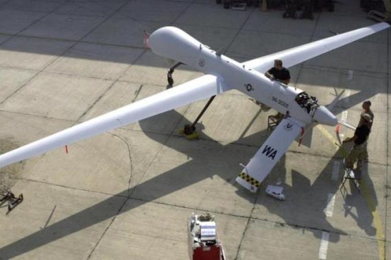 File photo of US Air Force staff doing checks on a Predator drone at an undisclosed location