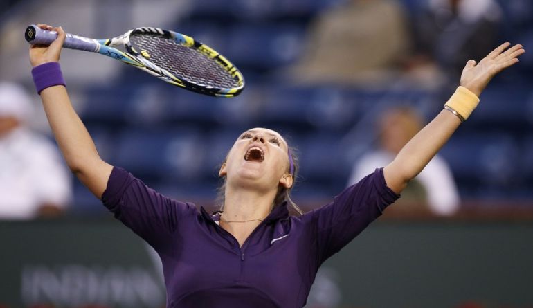 Victoria Azarenka of Belarus reacts after losing a point against Daniela Hantuchova of Slovakia during their match at the BNP Paribas Open WTA tennis tournament in Indian Wells, California