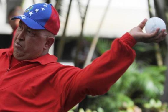 Venezuelan President Hugo Chavez tosses
