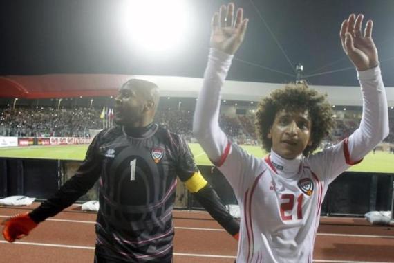 UAE''s Abdulrahman and Khussef Hamid acknowledge the fans as they celebrate their victory against Kuwait in their Gulf Cup Tournament semi-final soccer match in Isa Town