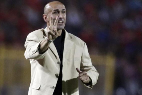 Libya''s Al-Ittihad coach Miodrag Jesic from Serbia gestures during their African Champions League match in Cairo