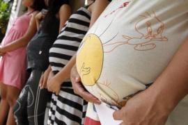Pregnant women attend lectures on family planning in a local government health centre in Navotas, Metro Manila
