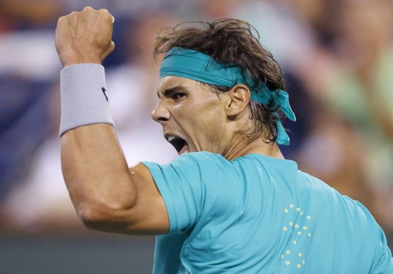 Rafael Nadal of Spain celebrates winning a point against Ernests Gulbis of Latvia in Indian Wells, California