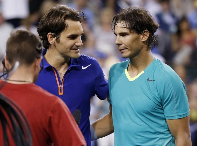 Federer of Switzerland and Nadal of Spain greet each other at the net after Nadal defeated Federer in their men''s singles quarterfinal match at the BNP Paribas Open ATP tennis tournament in Indian Wells