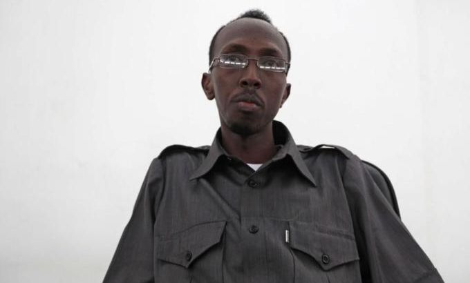 Somali journalist Abdinur poses for a photograph after the Somali high court freed him in Mogadishu
