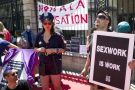 Sex workers activists attend a demonstration with prostitutes against a proposition to abolish prostitution in Lyon