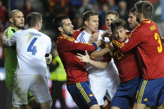 Spain and Finland football players