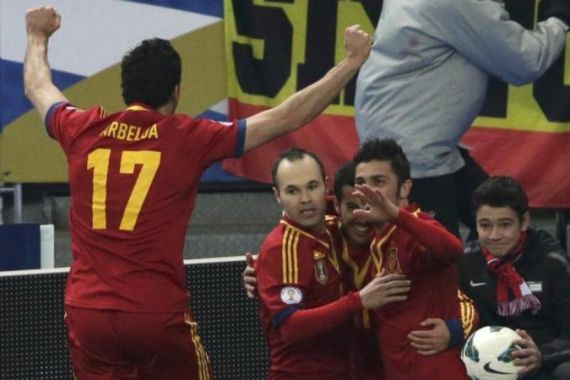 Spain''s Pedro Rodriguez Ledesma celebrates after scoring goal against France during their 2014 World Cup qualifying soccer match at the Stade de France stadium in Saint-Denis, near Paris