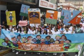 People take part in a march against child abuse along the streets of Asuncion