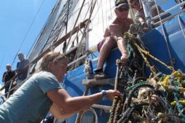 Handout photo of crew members lifting out ocean debris on board the Ocean Voyages Institute''s ship, the Kaisei, in the Pacific
