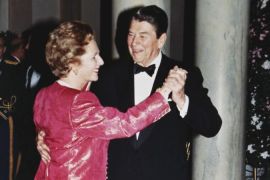File photo shows British Prime Minister Thatcher dancing with US President Reagan during State Dinner at White House in Washington