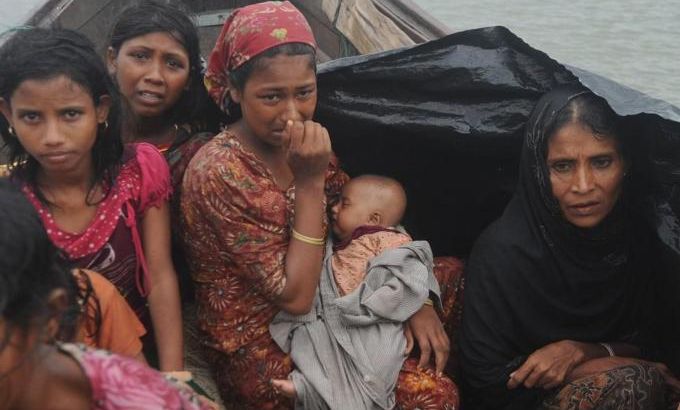 Rohingya Muslims, trying to cross the Na
