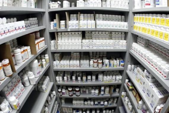 Pills line the shelves in the pharmacy at Venice Family Clinic in Los Angeles