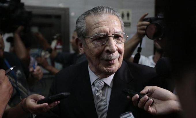 Former Guatemalan dictator Rios Montt speaks with media at end of session of his genocide trial, at Supreme Court of Justice in Guatemala City