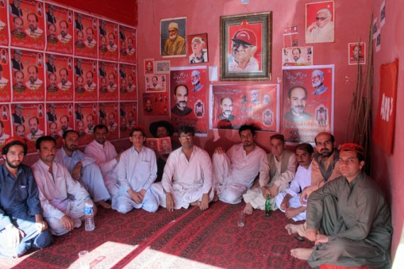 Workers of the ANP gathered at a local-level office in Quetta, Pakistan [Asad Hashim/Al Jazeera]
