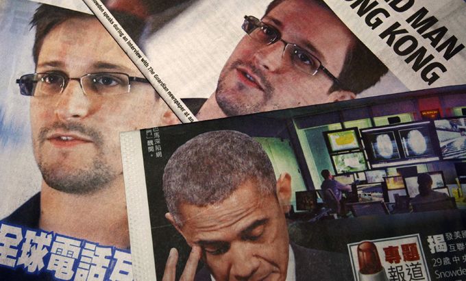 Photos of Edward Snowden, a contractor at the National Security Agency (NSA), and U.S. President Barack Obama