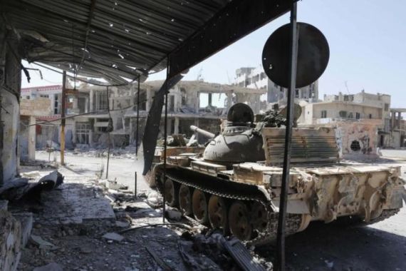 A military tank belonging to forces loyal to Syria''s President Assad is seen in Qusair