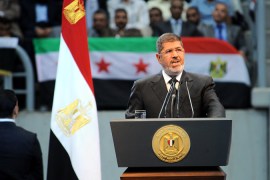 A handout photograph released by the Egyptian Presidency shows Egyptian President Mohamed Morsi