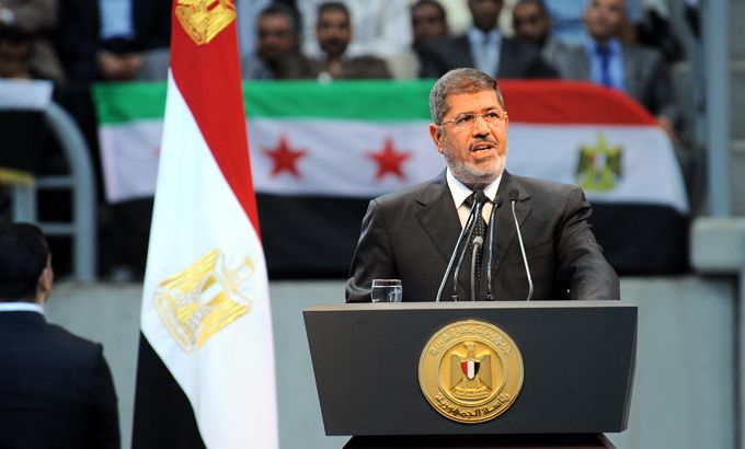 A handout photograph released by the Egyptian Presidency shows Egyptian President Mohamed Morsi