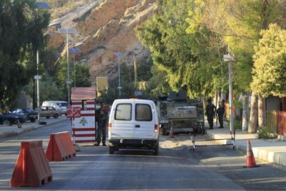 Lebanese army soldiers man a checkpoint following tensions after the killing of four Lebanese men in Bekaa