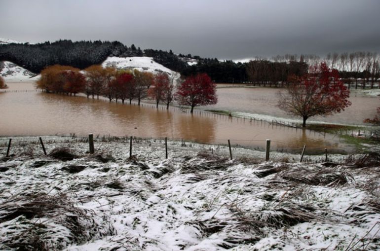 Flooded fields covered in snow