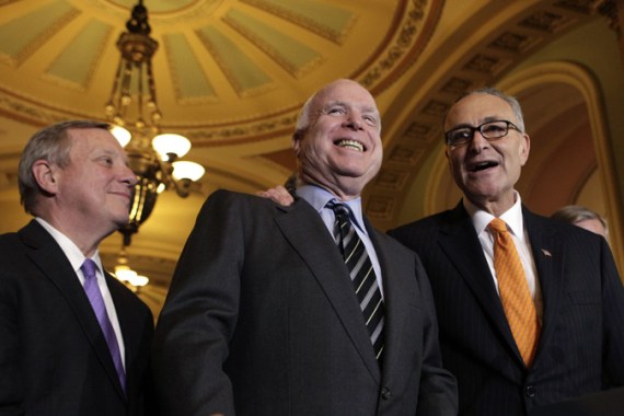 Senators Richard Durbin, John McCain and Chuck Schumer speak to the media after the Senate passed the immigration bill on Capitol Hill in Washington